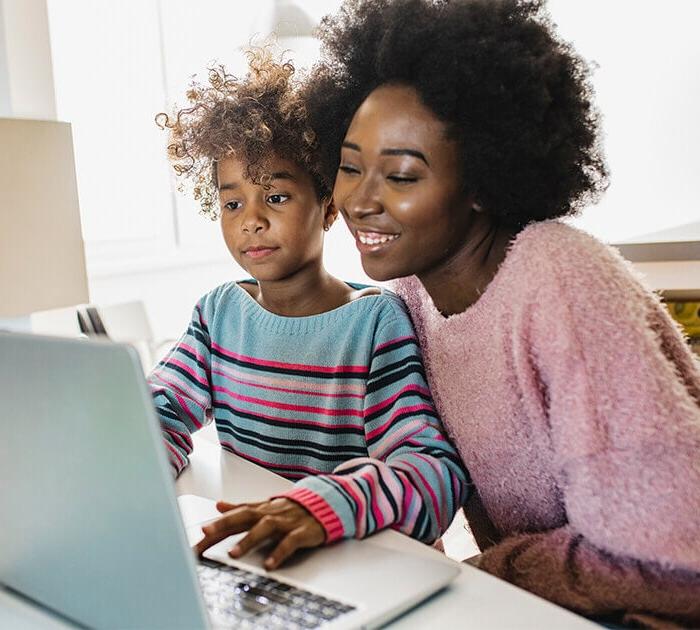 Parent helps her daughter with online elementary school courses - Connections Academy